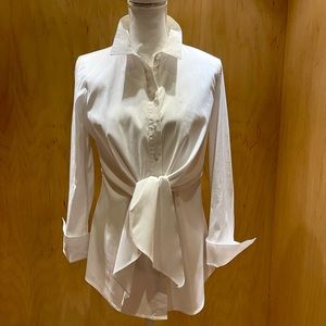 White dress blouse with tie front.  Only wore once; excellent condition